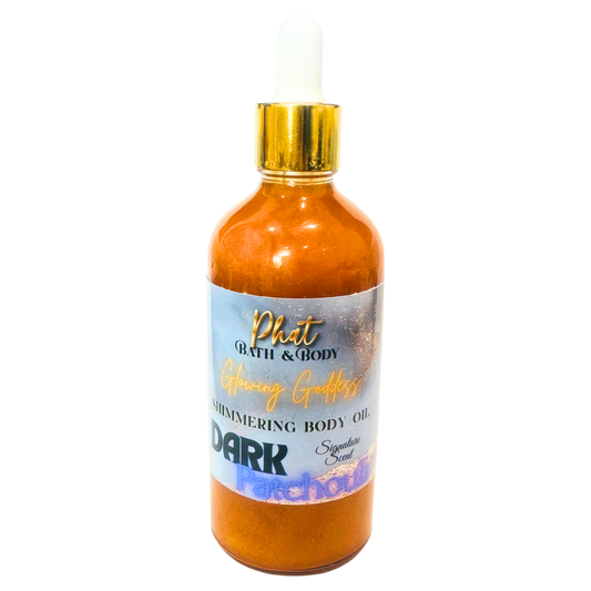 Bottle of Phat Bath & Body shimmering body oil on a white background