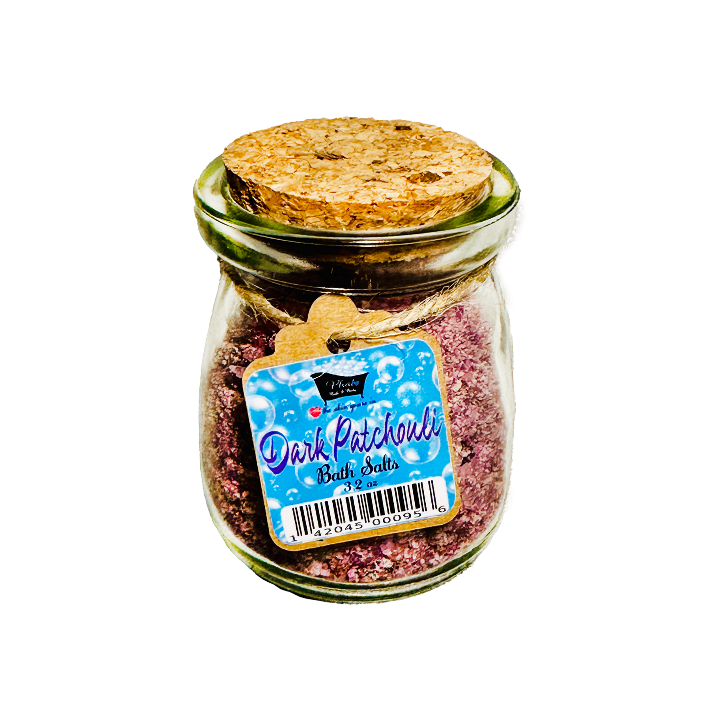 Jar of dark patchouli bath salts with a cork lid on a white background
