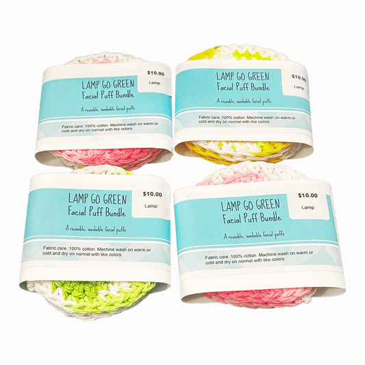 Four packages of Lamp Go Green Facial Puff Bundle on a dark background