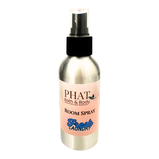 Room spray bottle with pink label on a white background