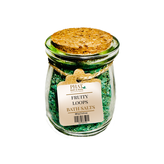 Jar of 'Fruity Loops' bath salts with a cork lid on a white background