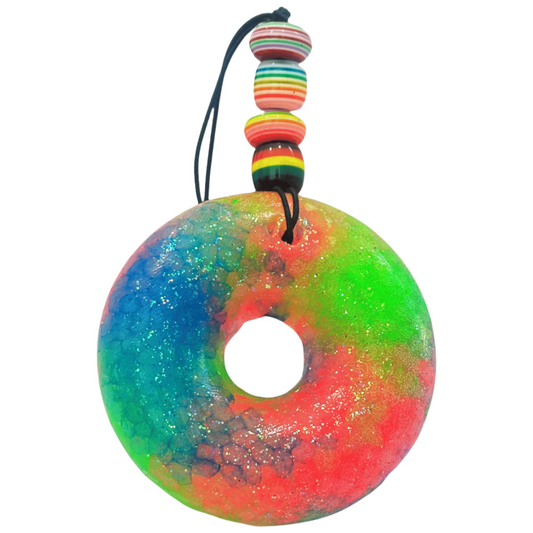 Colorful fruit loop-shaped car freshie with a multicolored beaded string on a white background