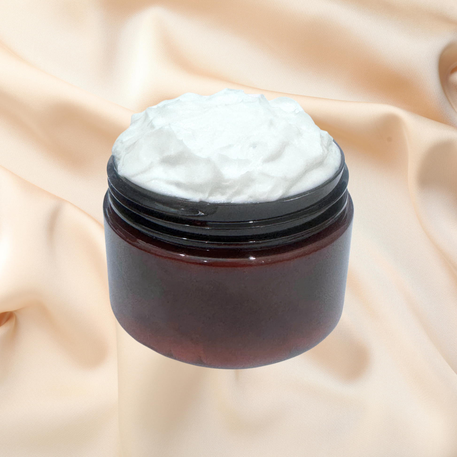 Jar of white cream on a beige fabric background