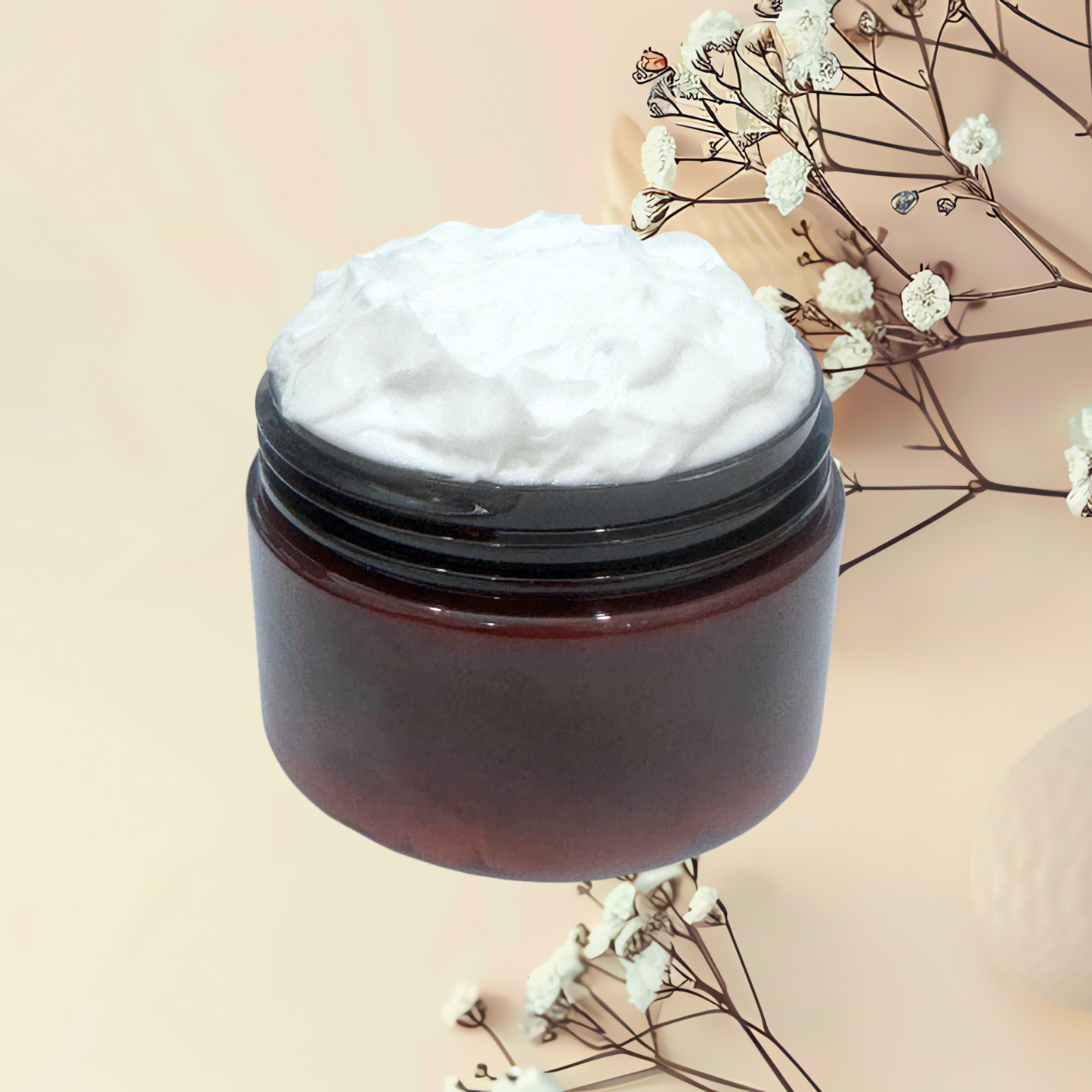 Brown jar with white cream on a beige background with dried flowers