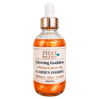 Phat Bath & Body Glowing Goddess Shimmer Body Oil in Garden Jasmine, 3.5 oz glass dropper bottle with luminous orange-gold shimmer oil.