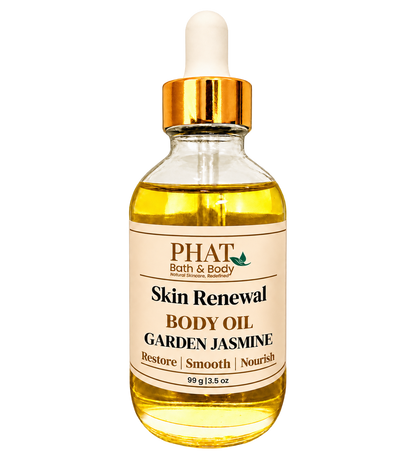 Phat Bath & Body Garden Jasmine Skin Renewal Body Oil, 3.5 oz golden body oil in a clear glass dropper bottle with a gold cap and cream label.