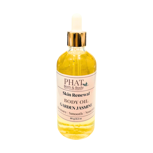 Bottle of Phat Bath & Body Skin Renewal Body Oil with Garden Jasmine fragrance on a white background