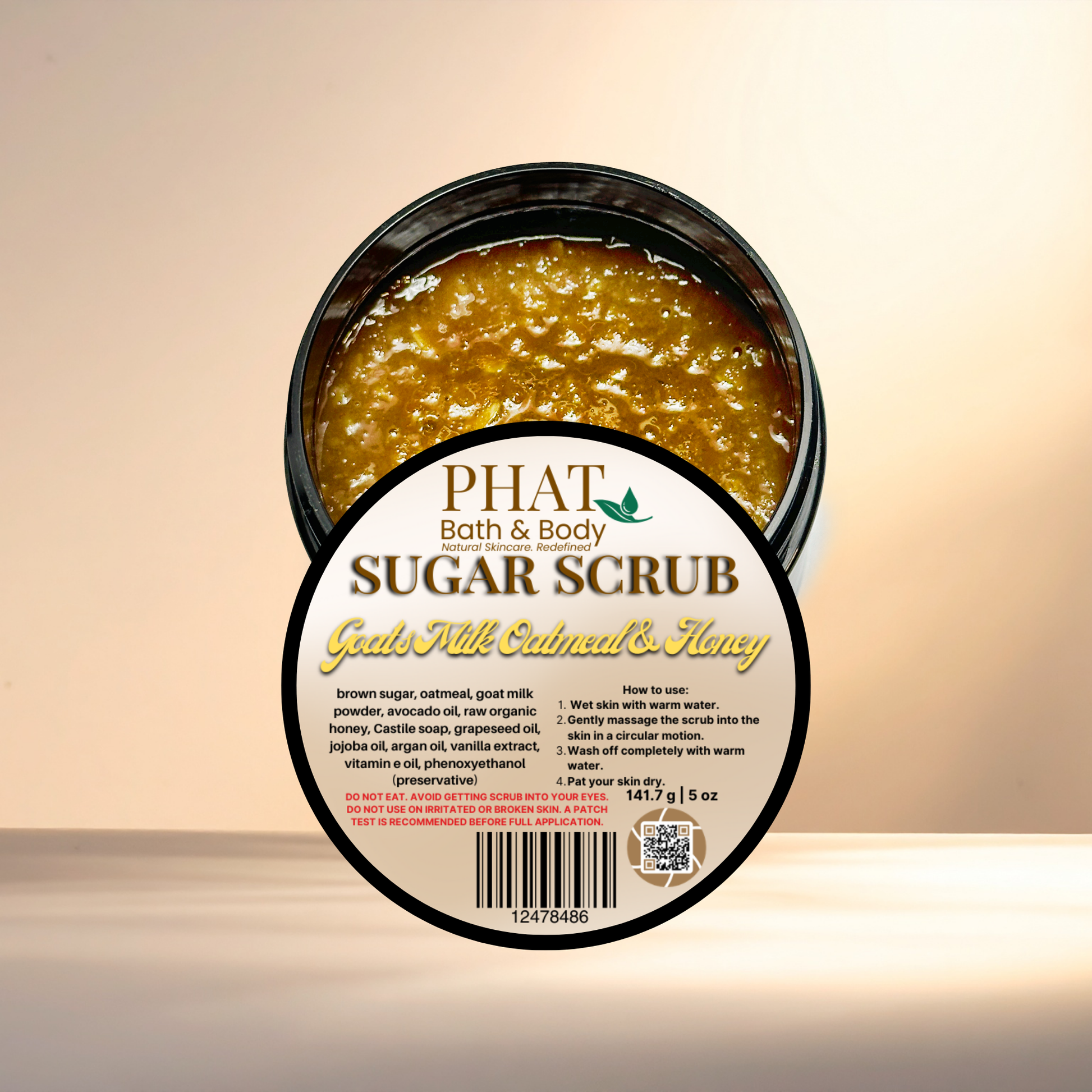 Jar of sugar scrub with a label on a beige background