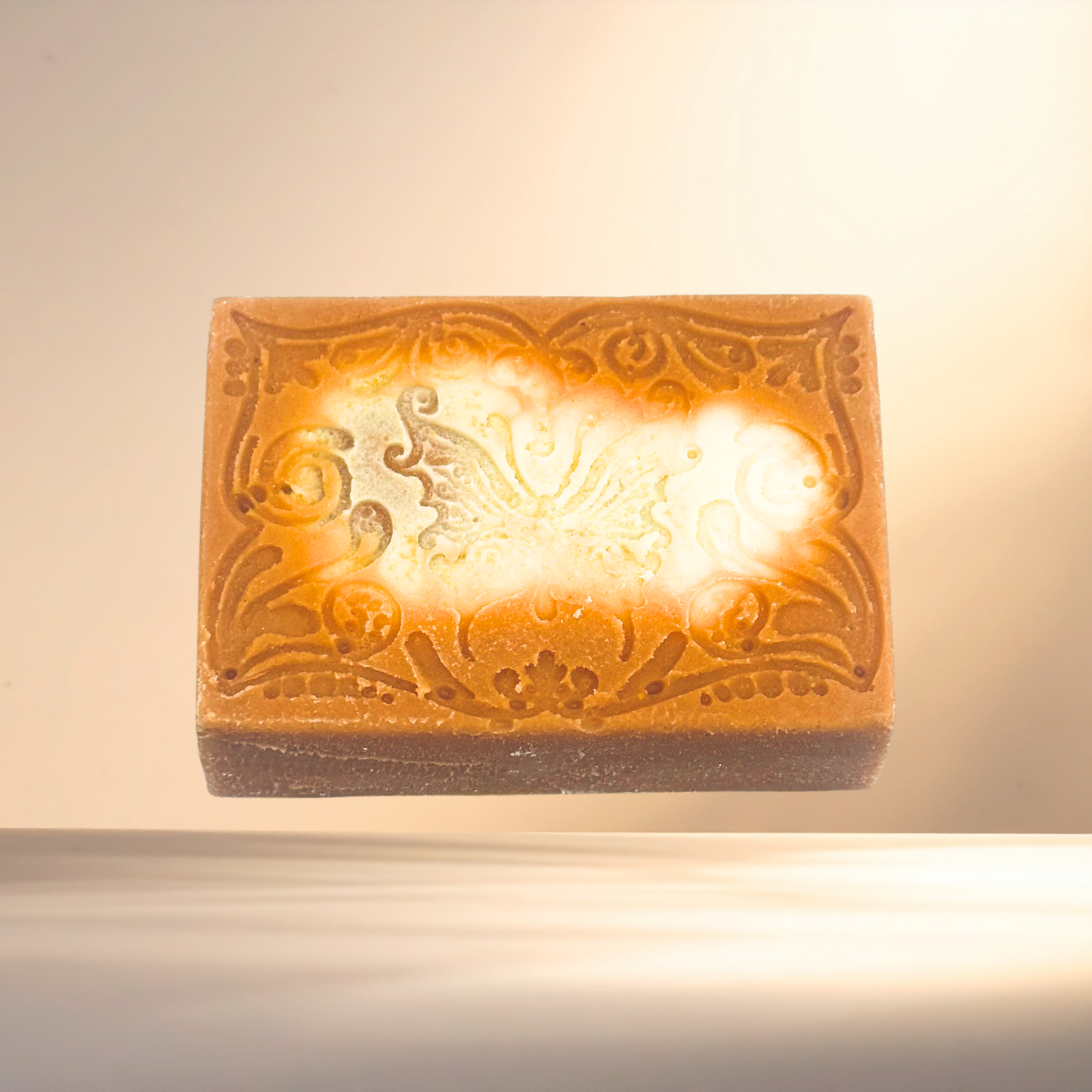 Decorative soap with intricate patterns on a beige background