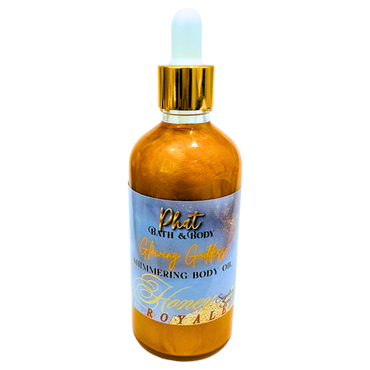 Bottle of Phat Bath & Body Shimmering Body Oil with a gold dropper on a white background