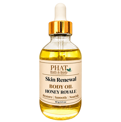 Phat Bath & Body Honey Royale Skin Renewal Body Oil, 3.5 oz golden body oil in a clear glass dropper bottle with a gold cap and cream label.