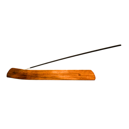Wooden incense holder with a black incense stick on a white background