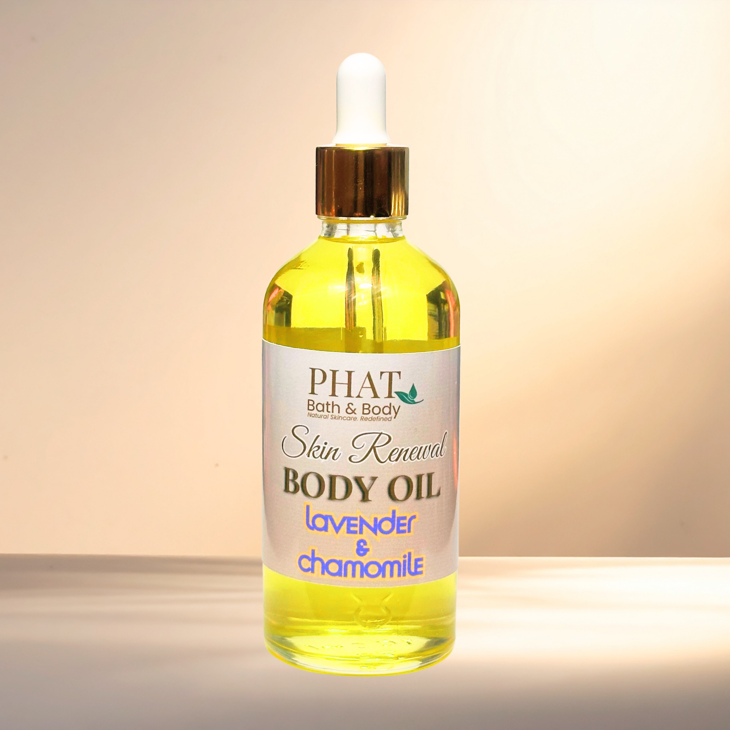 Bottle of PHAT Bath & Body Skin Renewal Body Oil with a dropper on a gradient background
