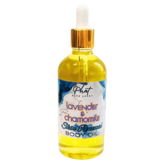 Bottle of lavender and chamomile body oil with a dropper on a white background