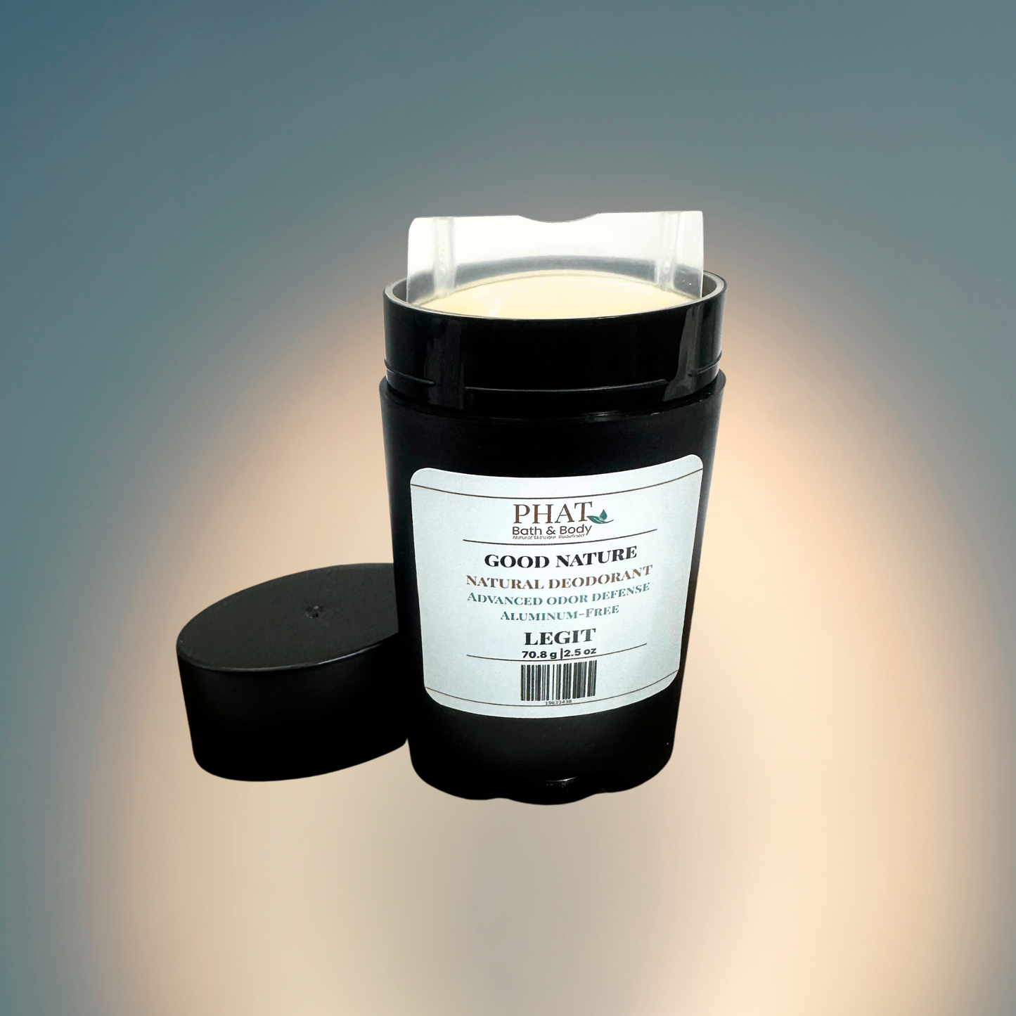 A black cylindrical natural deodorant stick with its cap off and placed beside it on a soft gradient background. The product label reads Legit GOOD NATURE Natural Deodorant.