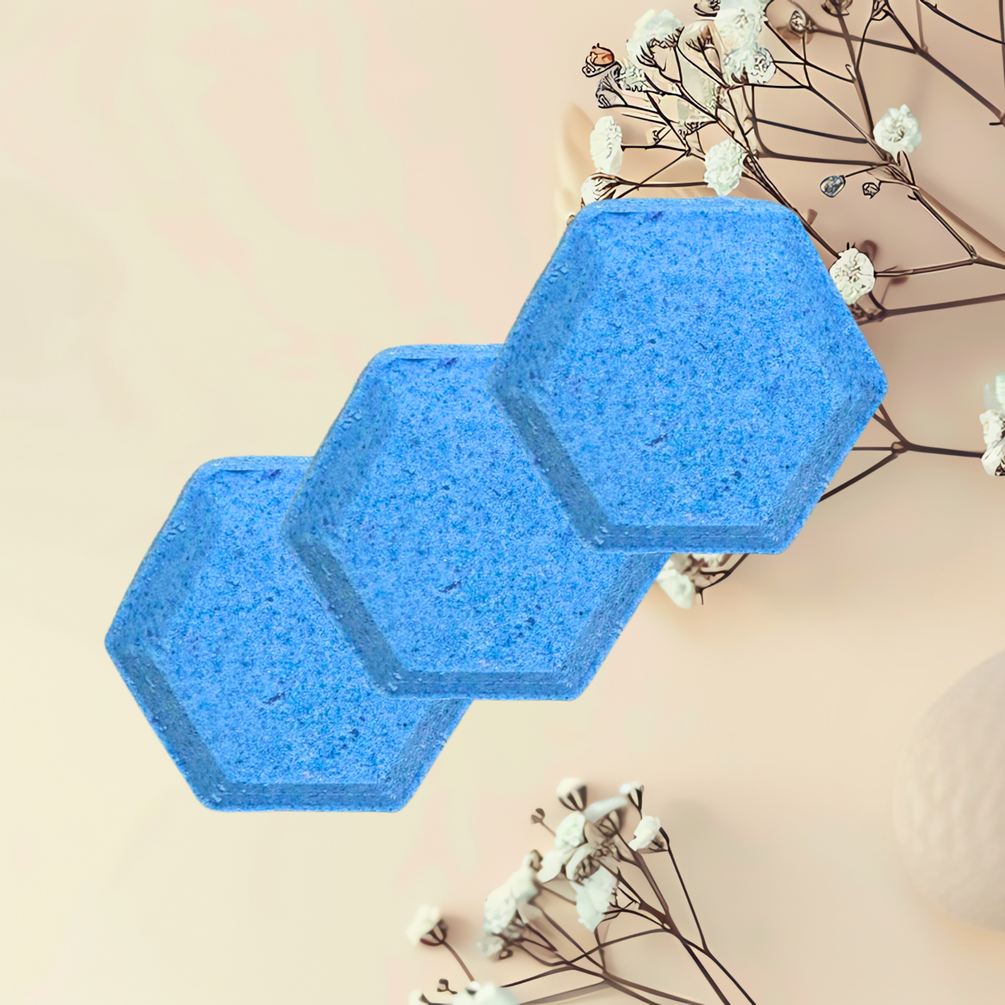 Hexagonal blue steamers on a beige background with white flowers
