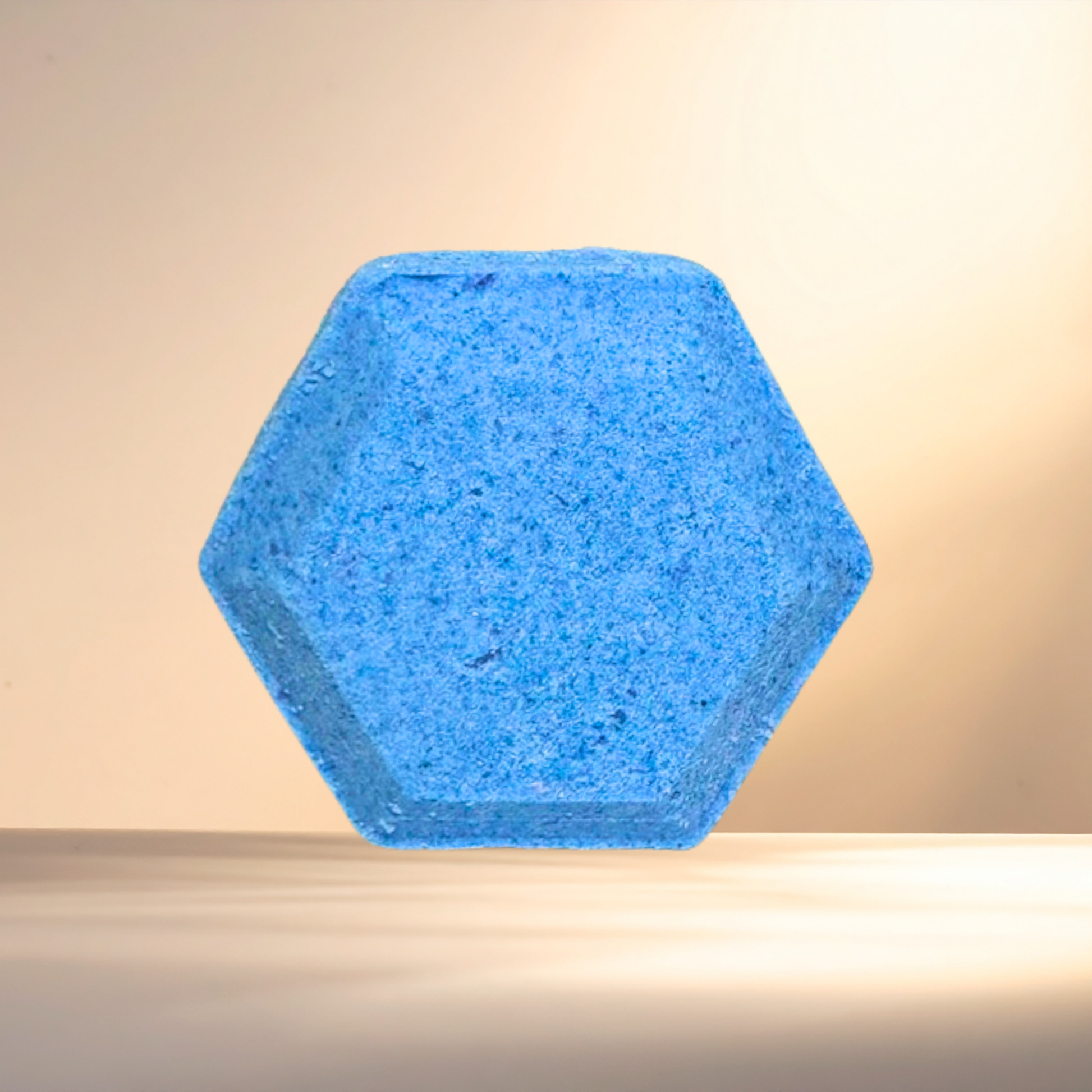 Hexagonal blue steamer on a beige background