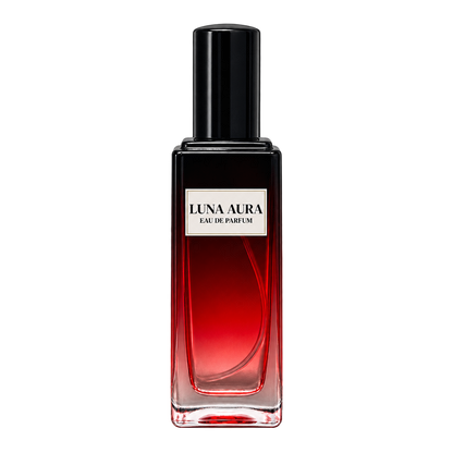 Phat Bath & Body Luna Aura Eau de Parfum in a tall clear glass bottle with black cap, warm tan label, and red-toned fragrance, shown as the main product image.