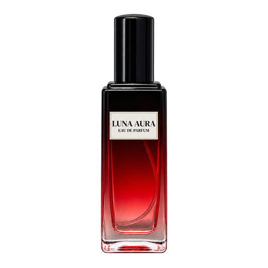 Phat Bath & Body Luna Aura Eau de Parfum in a tall clear glass bottle with black cap, warm tan label, and red-toned fragrance, shown as the main product image.