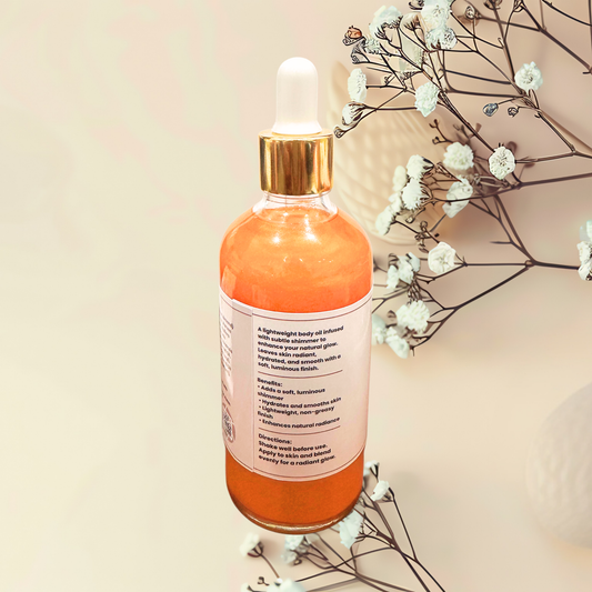 Bottle of orange liquid with dropper on a beige background with white flowers