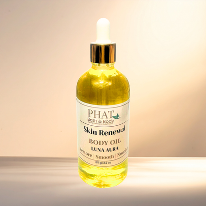 Bottle of PHAT Bath & Body Skin Renewal Body Oil on a gradient background