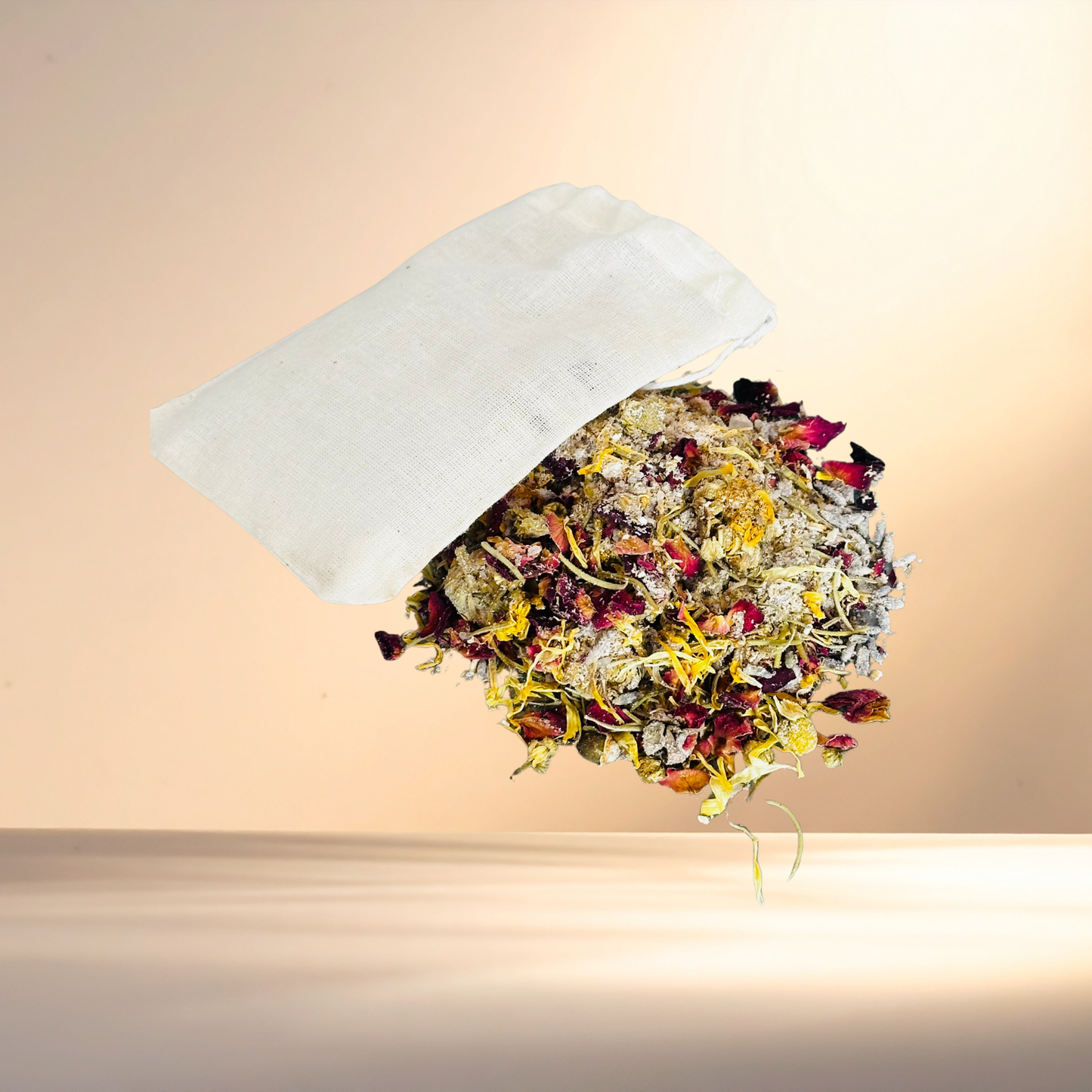 Tea bag with colorful dried herbs on a beige background