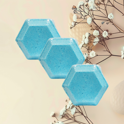 Three blue hexagonal steamers on a beige background with white flowers.