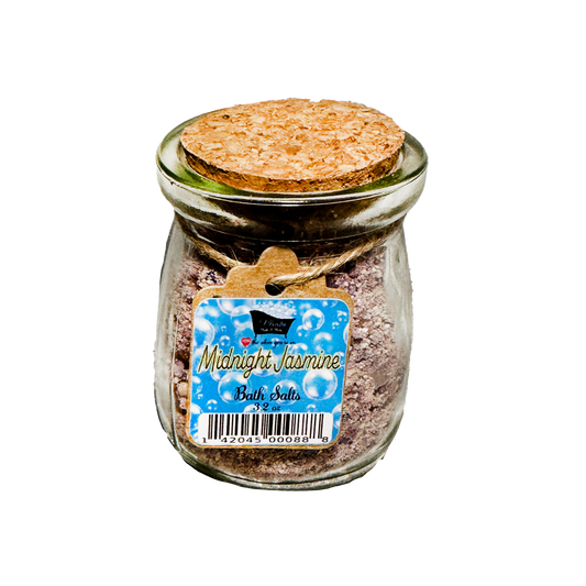 Jar of 'Midnight Jasmine' bath salts with a cork lid on a white background