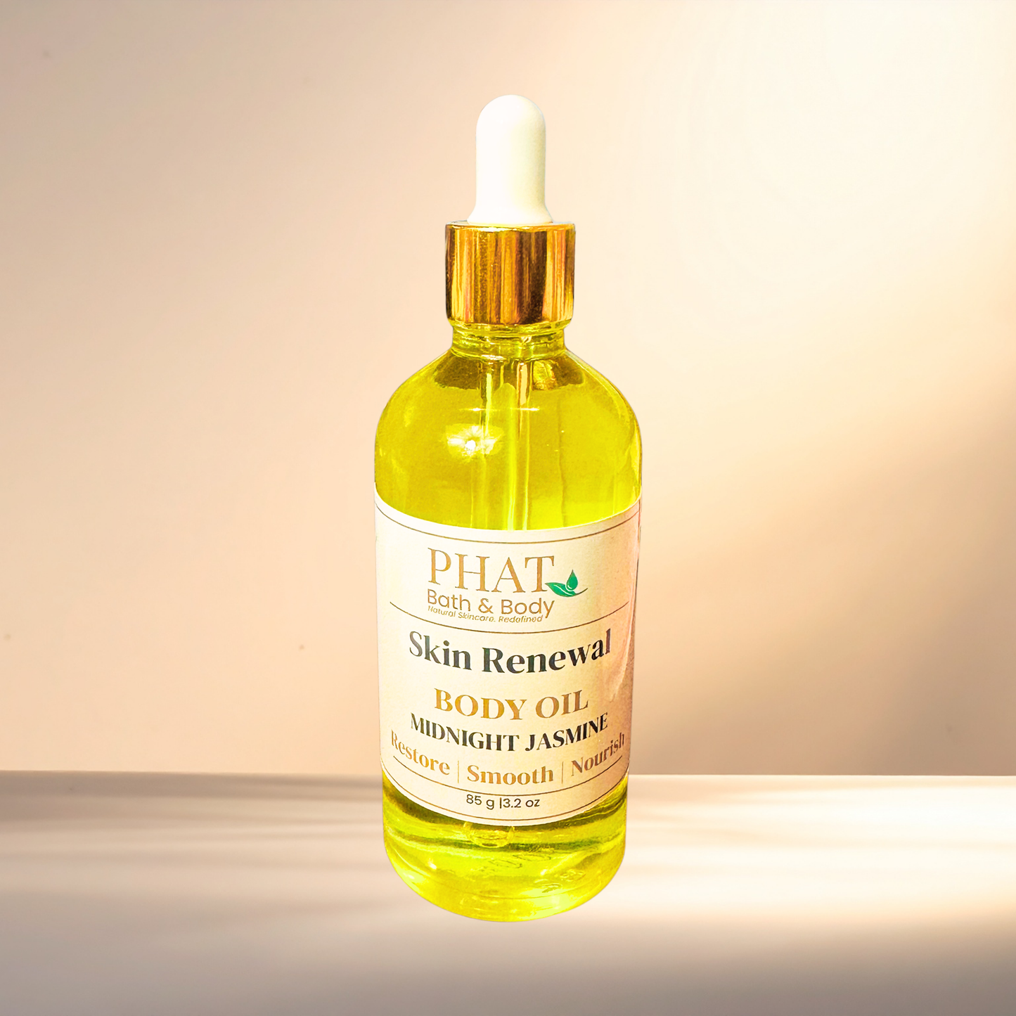 Bottle of PHAT Bath & Body Skin Renewal Body Oil on a gradient background