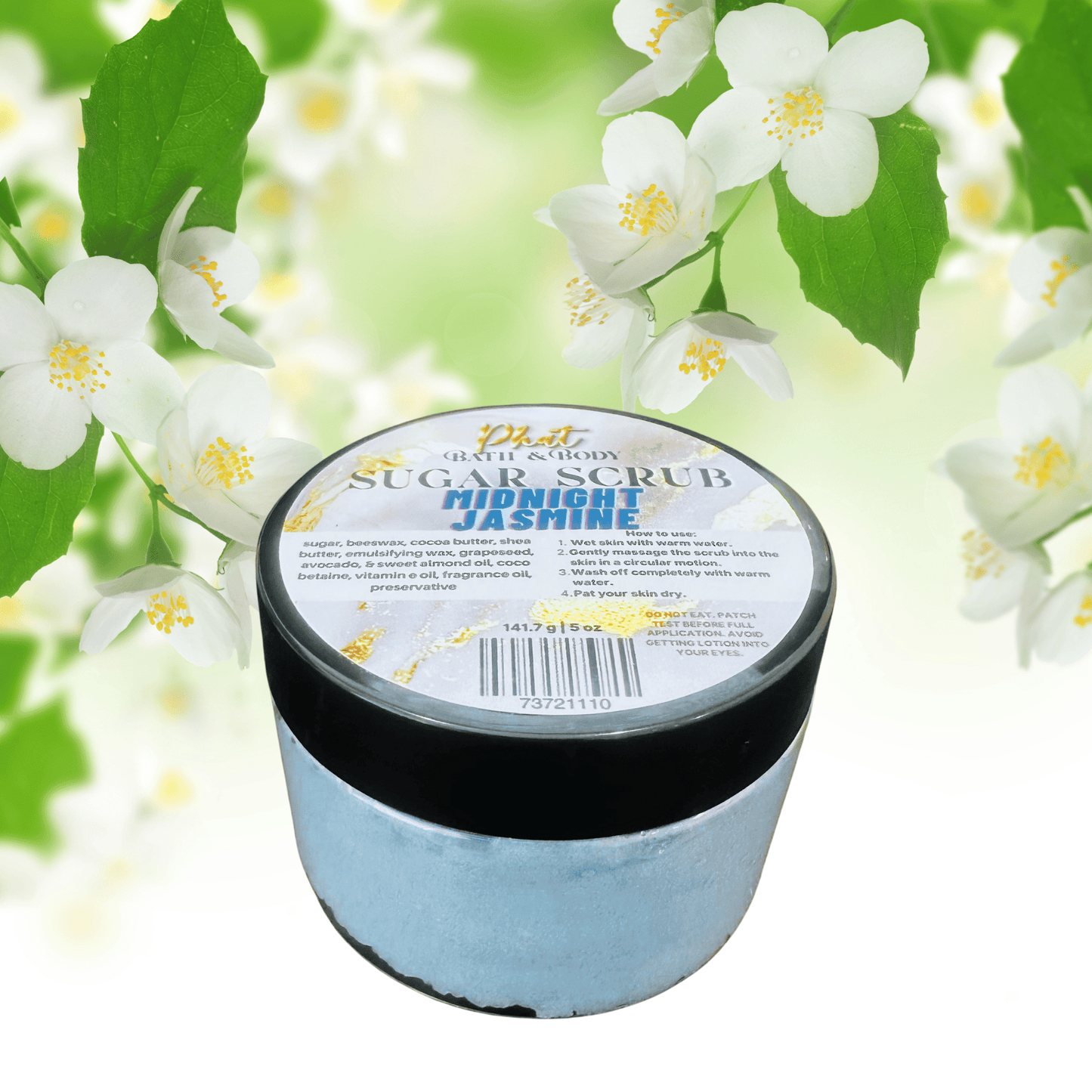 Jar of sugar scrub with jasmine flowers in the background