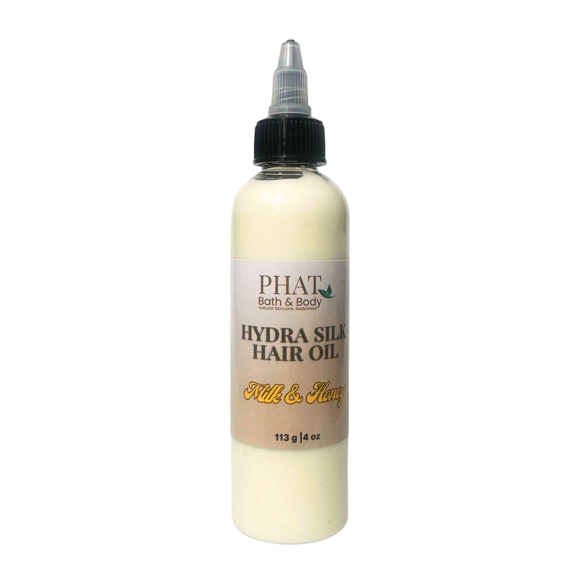 Bottle of Phat Bath & Body Hydra Silk Hair Oil on a white background