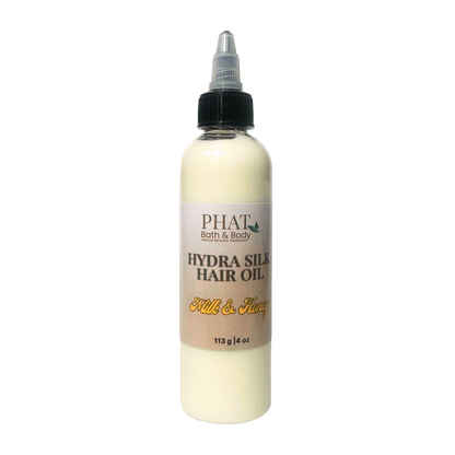 Bottle of Phat Bath & Body Hydra Silk Hair Oil on a white background