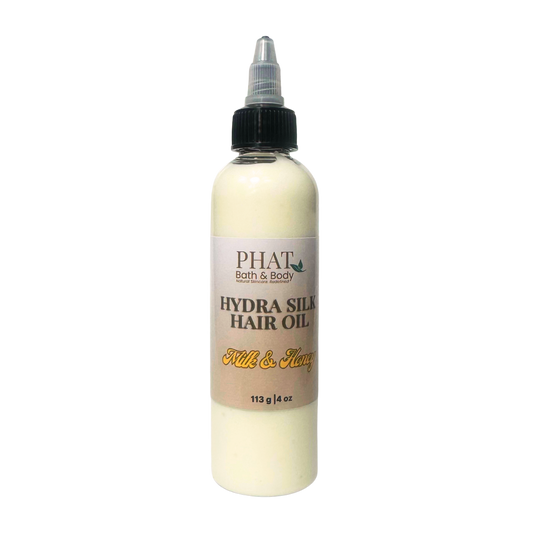 Bottle of Phat Bath & Body Hydra Silk Hair Oil on a white background