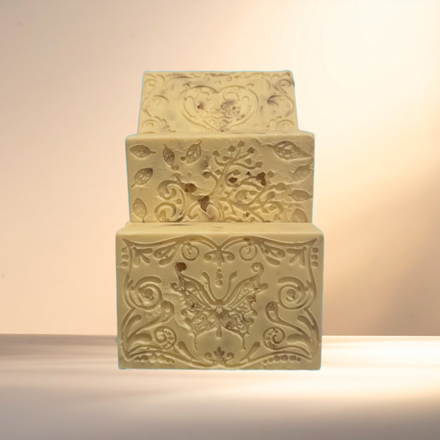 Decorative soap with intricate carvings on a neutral background