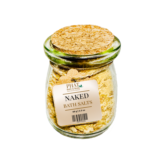 Jar of Naked Bath Salts with a cork lid on a white background