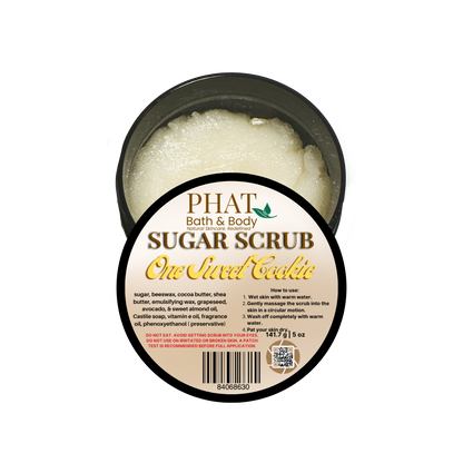 Jar of sugar scrub with a label on a white background