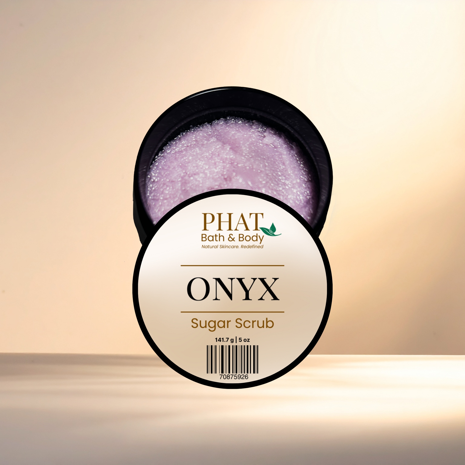 Onyx sugar scrub container with visible brand name on a beige background
