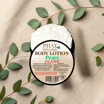 Body lotion container with 'Phat Bath & Body' label on a beige fabric background with green leaves.