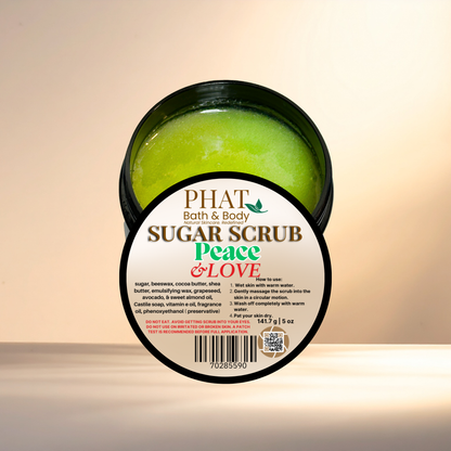 Jar of sugar scrub with 'Phat Bath & Body' label on a beige background
