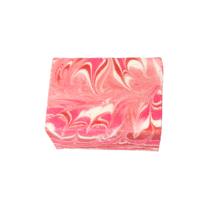 Marbled pink and white soap bar on a white background
