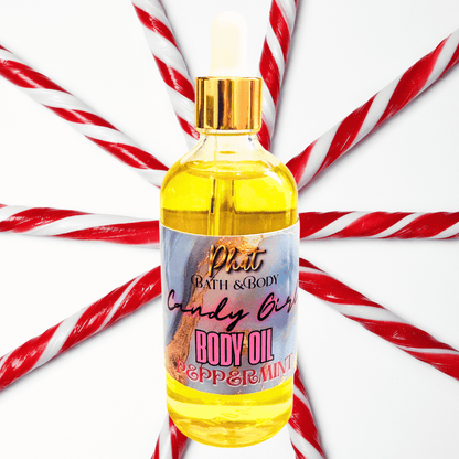 Body oil bottle with candy cane background