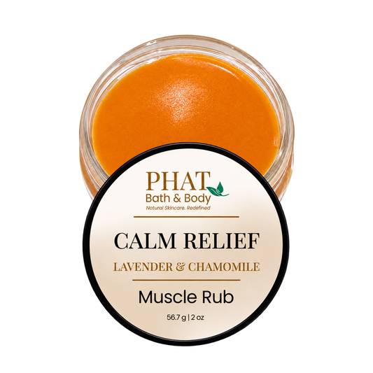 Phat Bath & Body Calm Relief Muscle Rub in Lavender & Chamomile, shown in a 2 oz jar with smooth orange balm. Natural muscle rub designed for massage of tired areas with a comforting botanical formula.