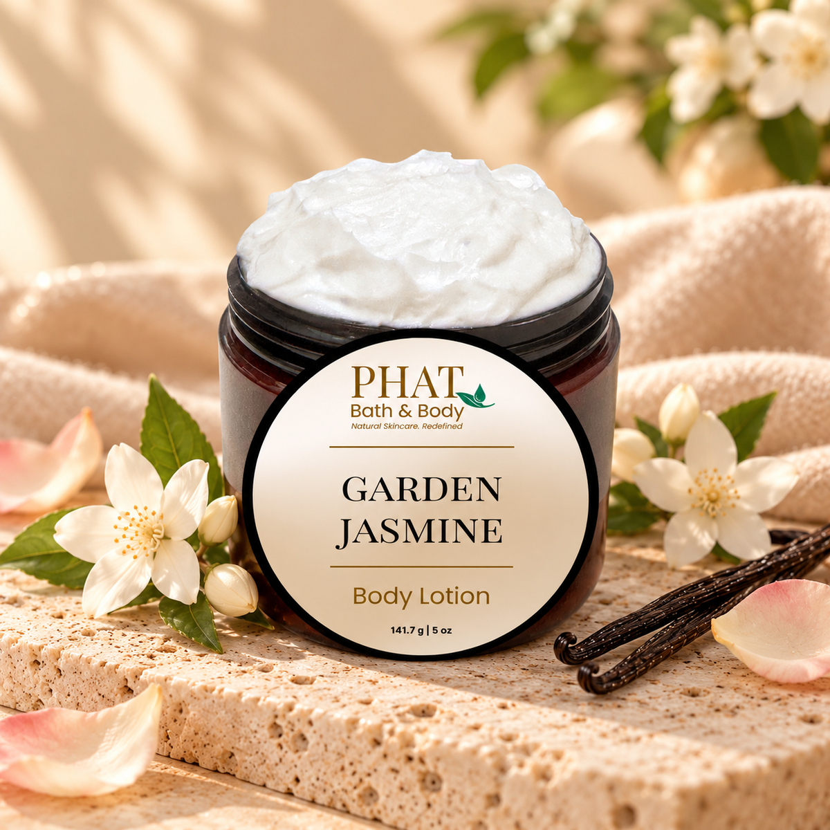 Phat Bath & Body Garden Jasmine Body Lotion styled with soft jasmine, rose, fresh greenery, and warm neutral accents.