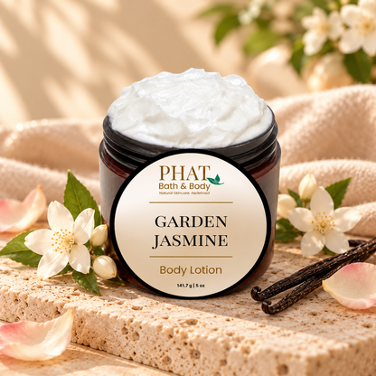 Phat Bath & Body Garden Jasmine Body Lotion styled with soft jasmine, rose, fresh greenery, and warm neutral accents.