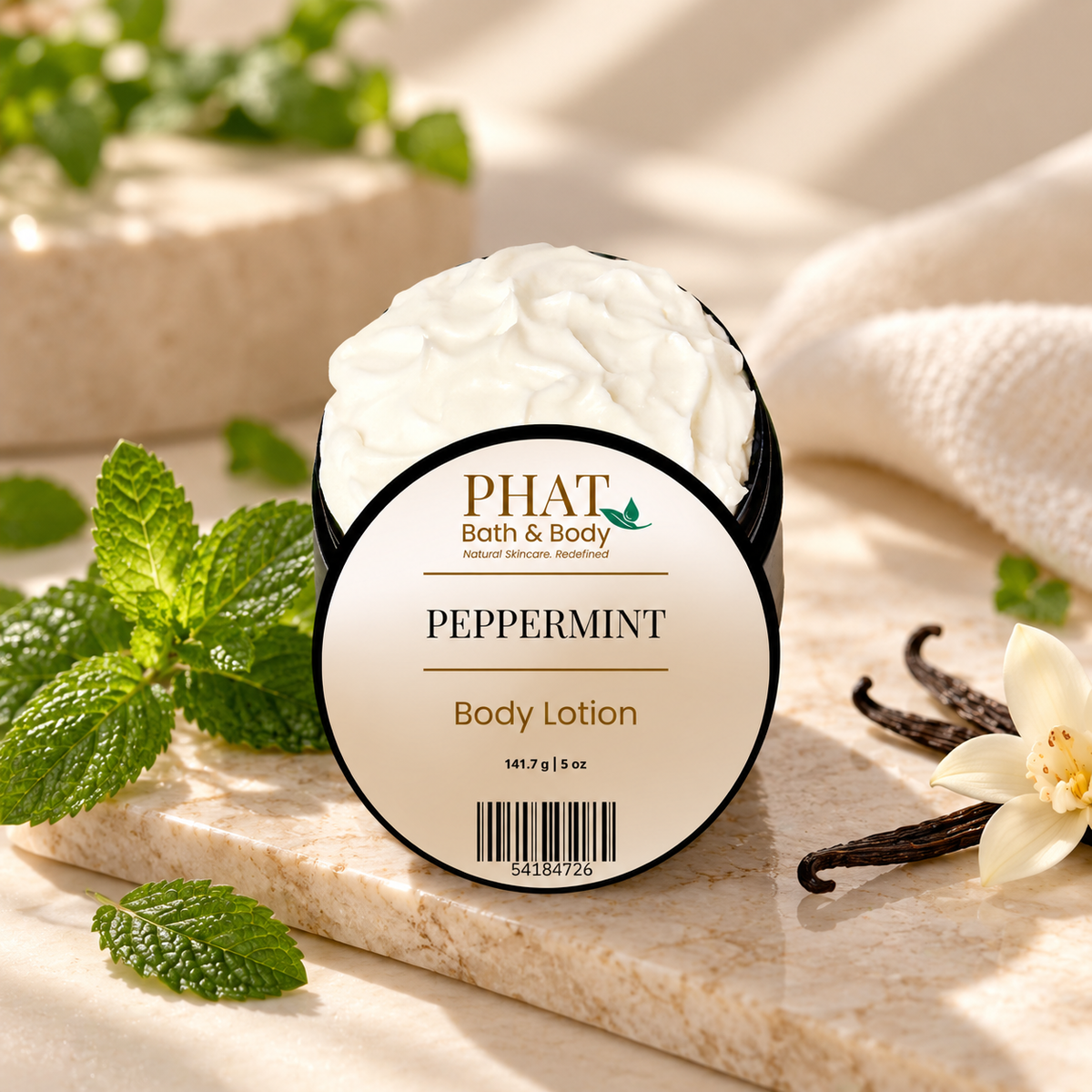 Phat Bath & Body Peppermint Body Lotion styled with fresh peppermint leaves and soft vanilla accents for a clean, refreshing presentation.