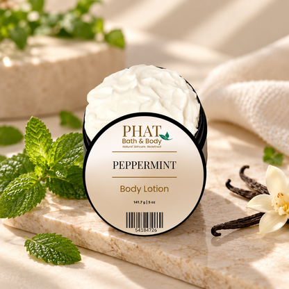 Phat Bath & Body Peppermint Body Lotion styled with fresh peppermint leaves and soft vanilla accents for a clean, refreshing presentation.