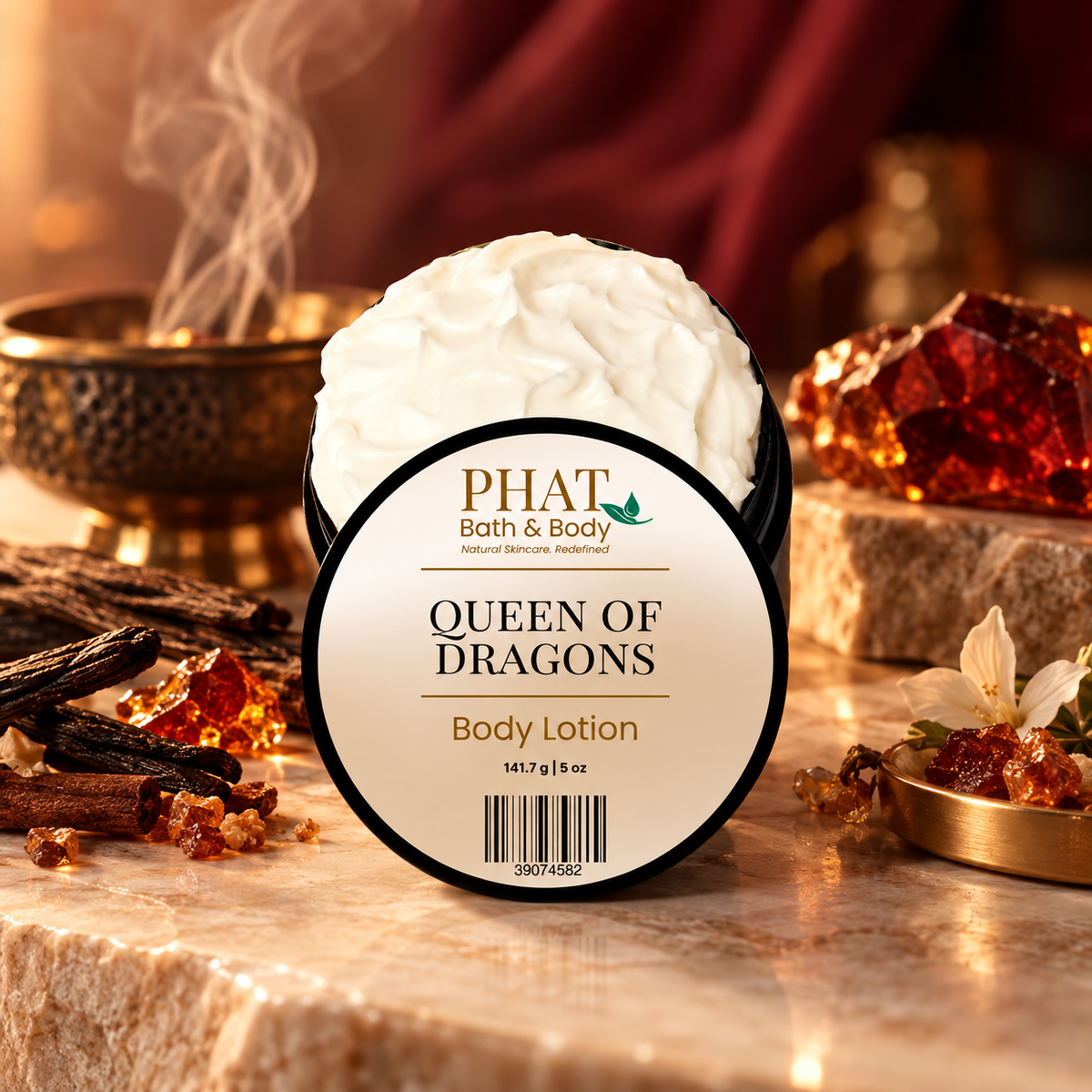 Phat Bath & Body Queen of Dragons Body Lotion styled with Dragon’s Blood resin, warm amber, earthy woods, incense, and deep red accents.