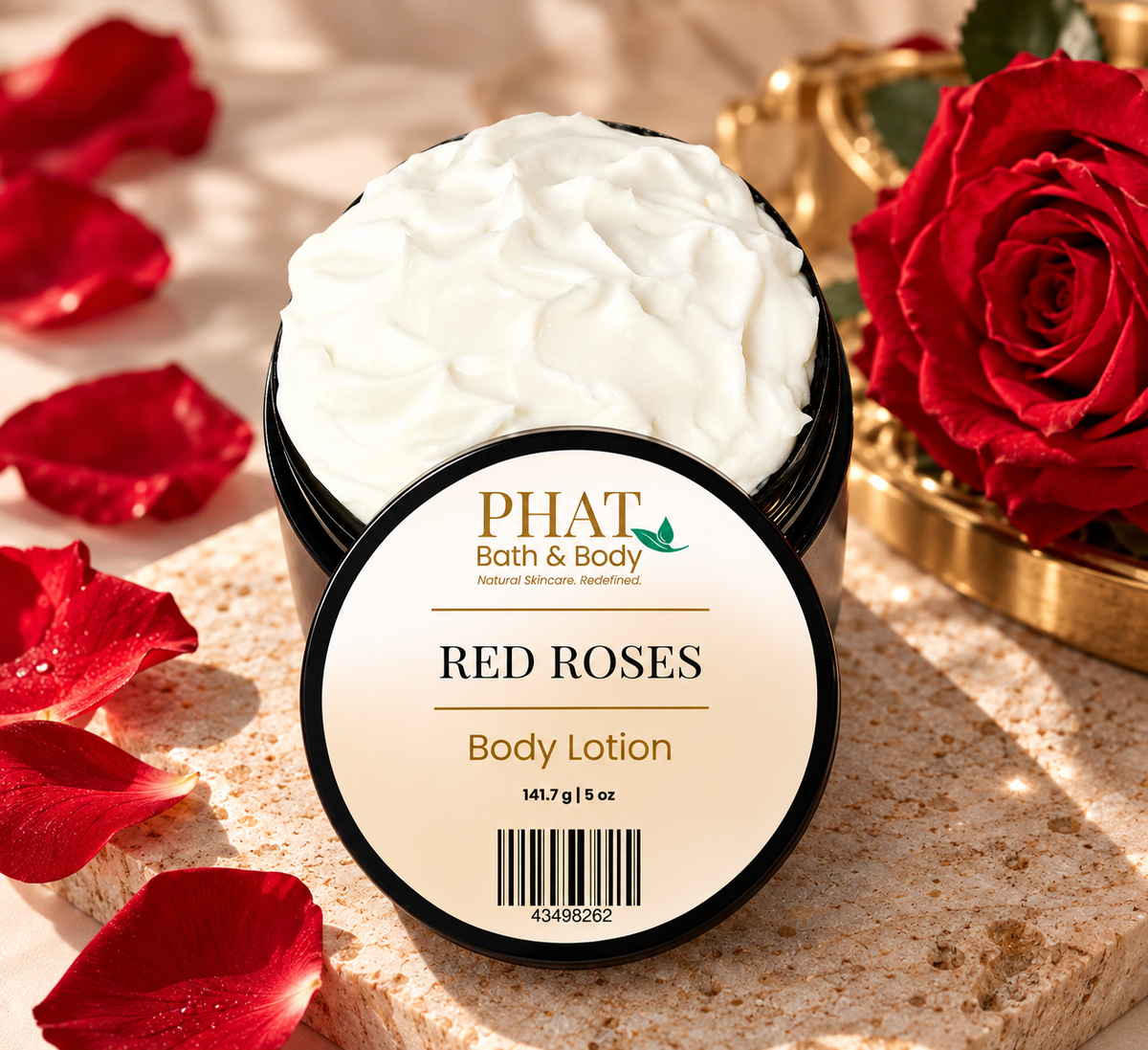 Phat Bath & Body Red Roses Body Lotion in a black 5 oz jar with whipped lotion, styled with fresh red roses and floral accents.