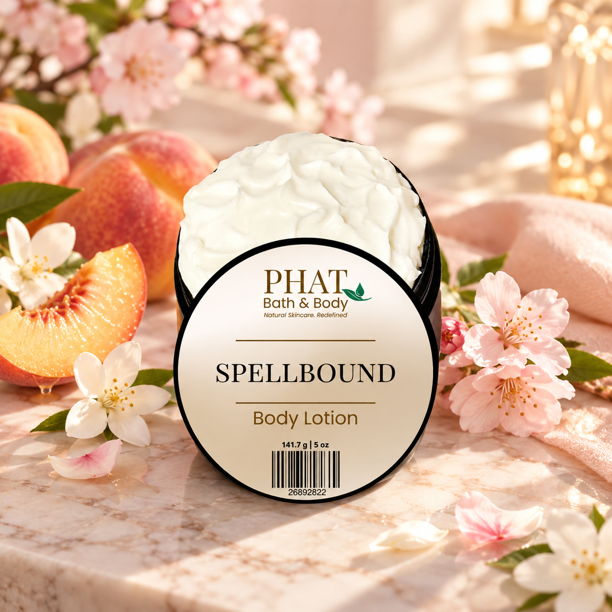 Phat Bath & Body Spellbound Body Lotion styled with peach, cherry blossom and soft white jasmine.