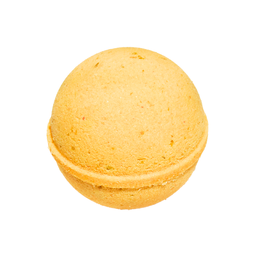 Yellow bath bomb on a white background